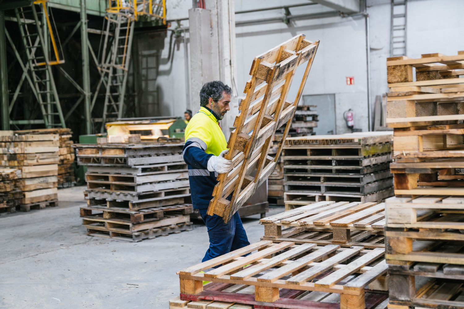 Repairing and sorting pallets in the shop